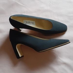 Beautiful Black with Gold Sole lining Heel.